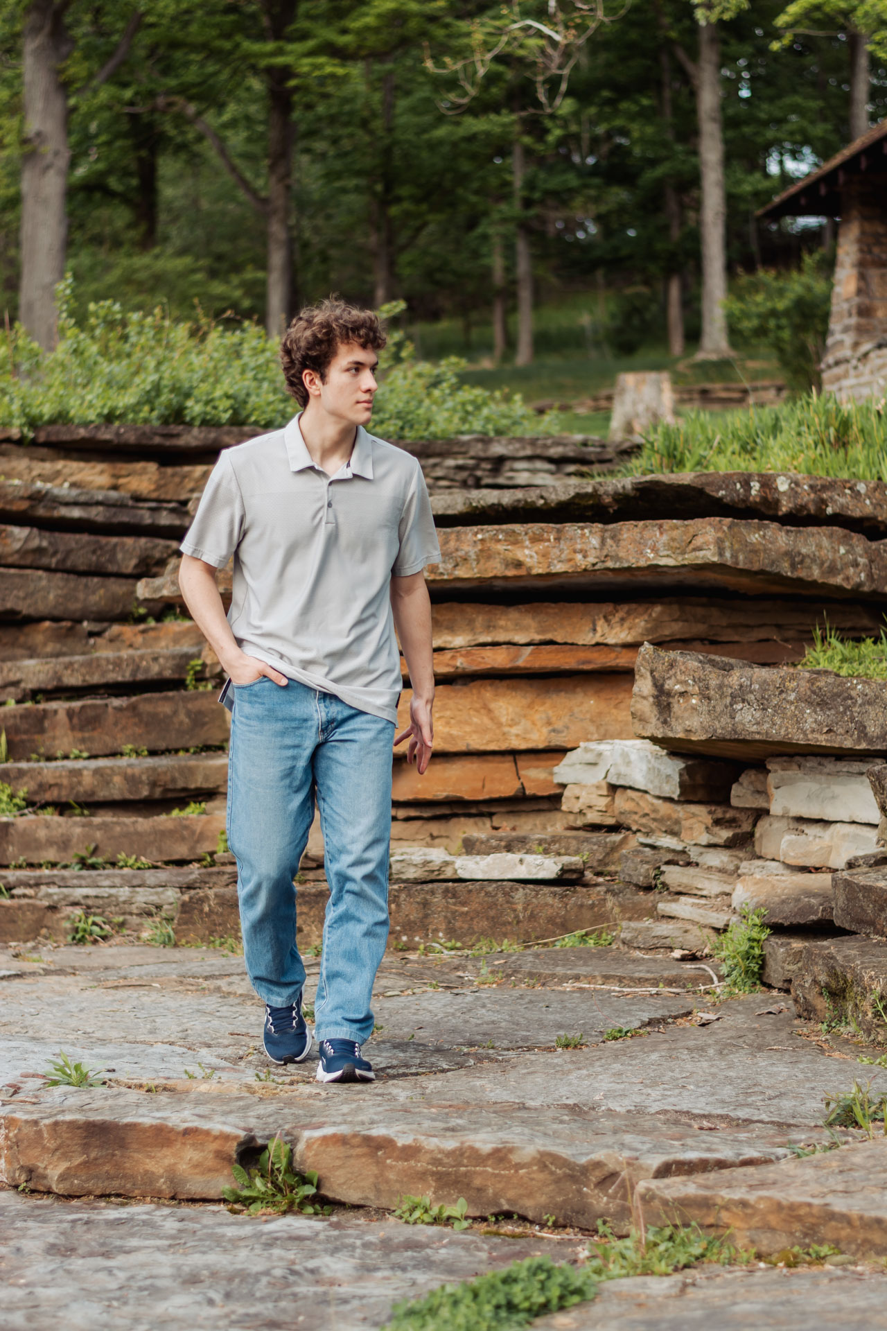 High school senior in warm golden-hour light during a portrait session near Pittsburgh